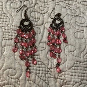 Pink Beaded Boutique chandelier earrings.